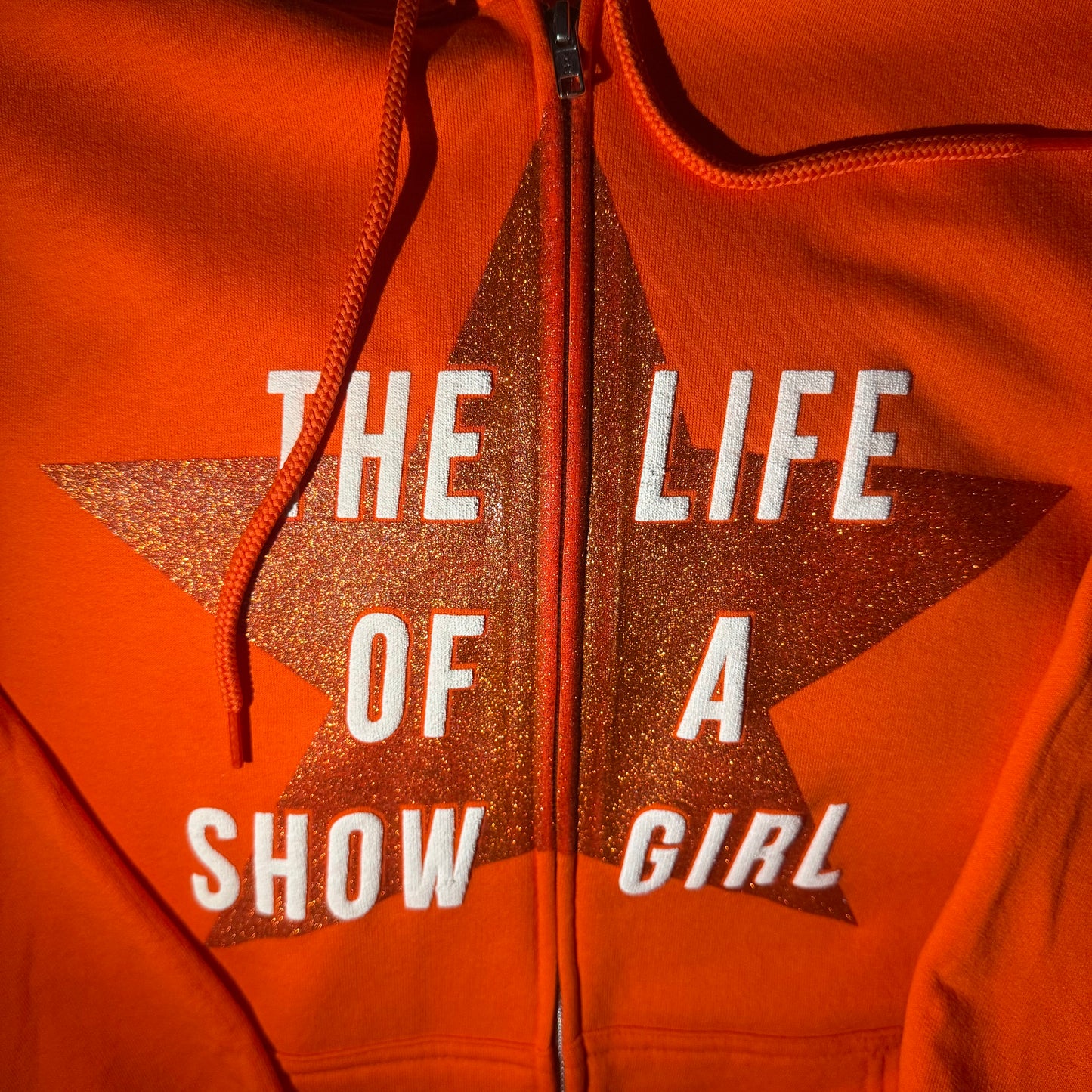 SHOWGIRL STAR ZIP